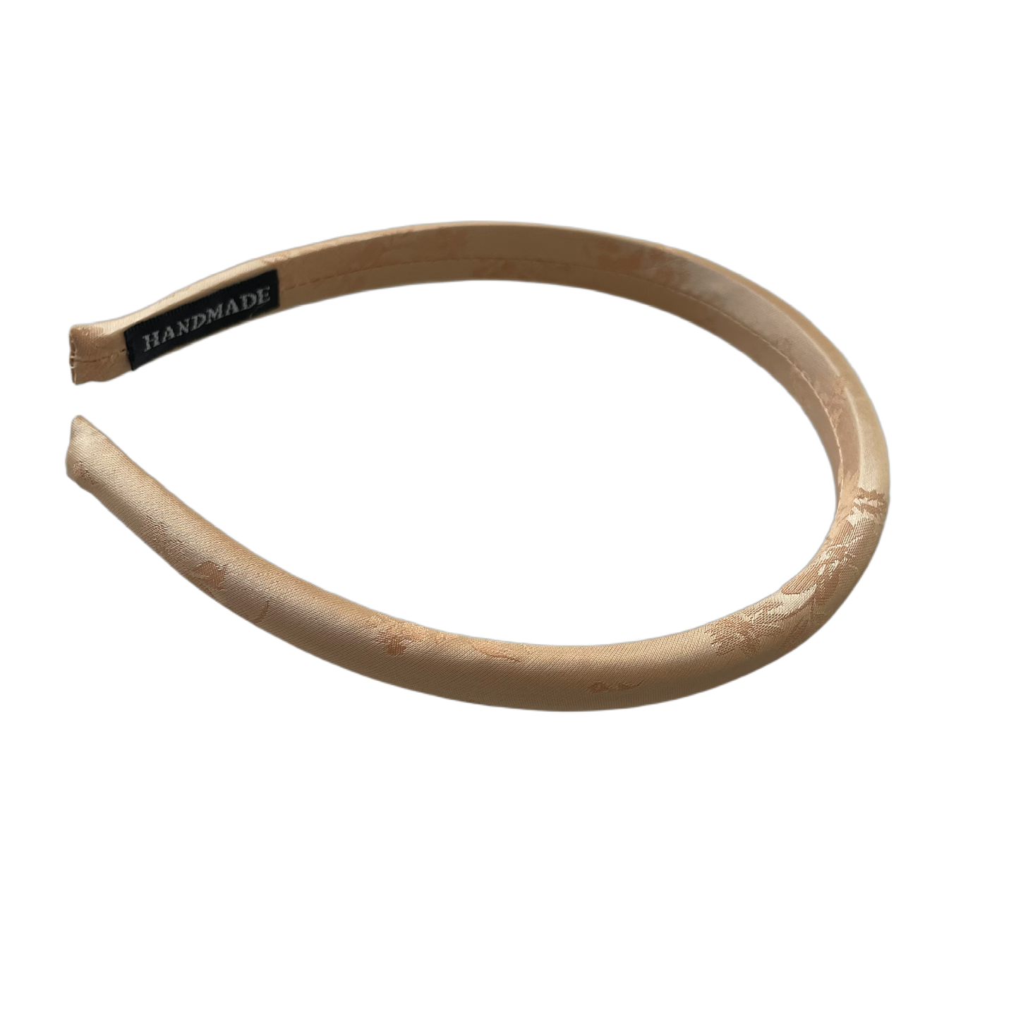 Frisch und doch edel – Lachsfarbener Jacquard-Haarreif