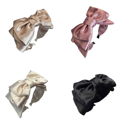 Retro‑Knoten — Satinschleife im ikonischen Rockabilly‑Stil