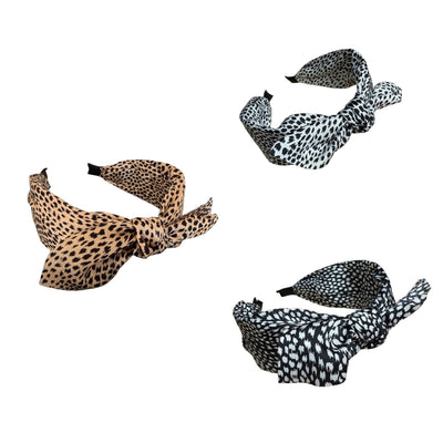 Präriepoesie — Eleganter Satinreif mit Animalprint und Schleifenakzent