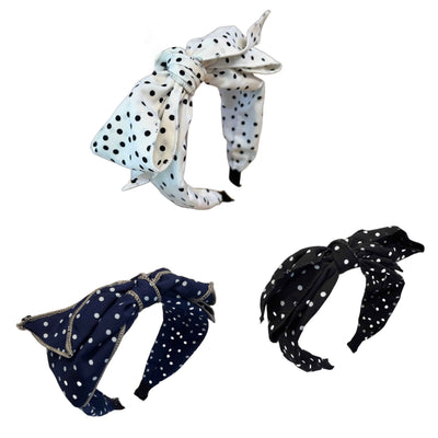 Dottie Diva — Retro‑Haarreif mit markanter Top‑Schleife