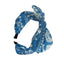 Vintage Pep: Zweifarbiger Rockabilly-Haarreif mit verspieltem Muster