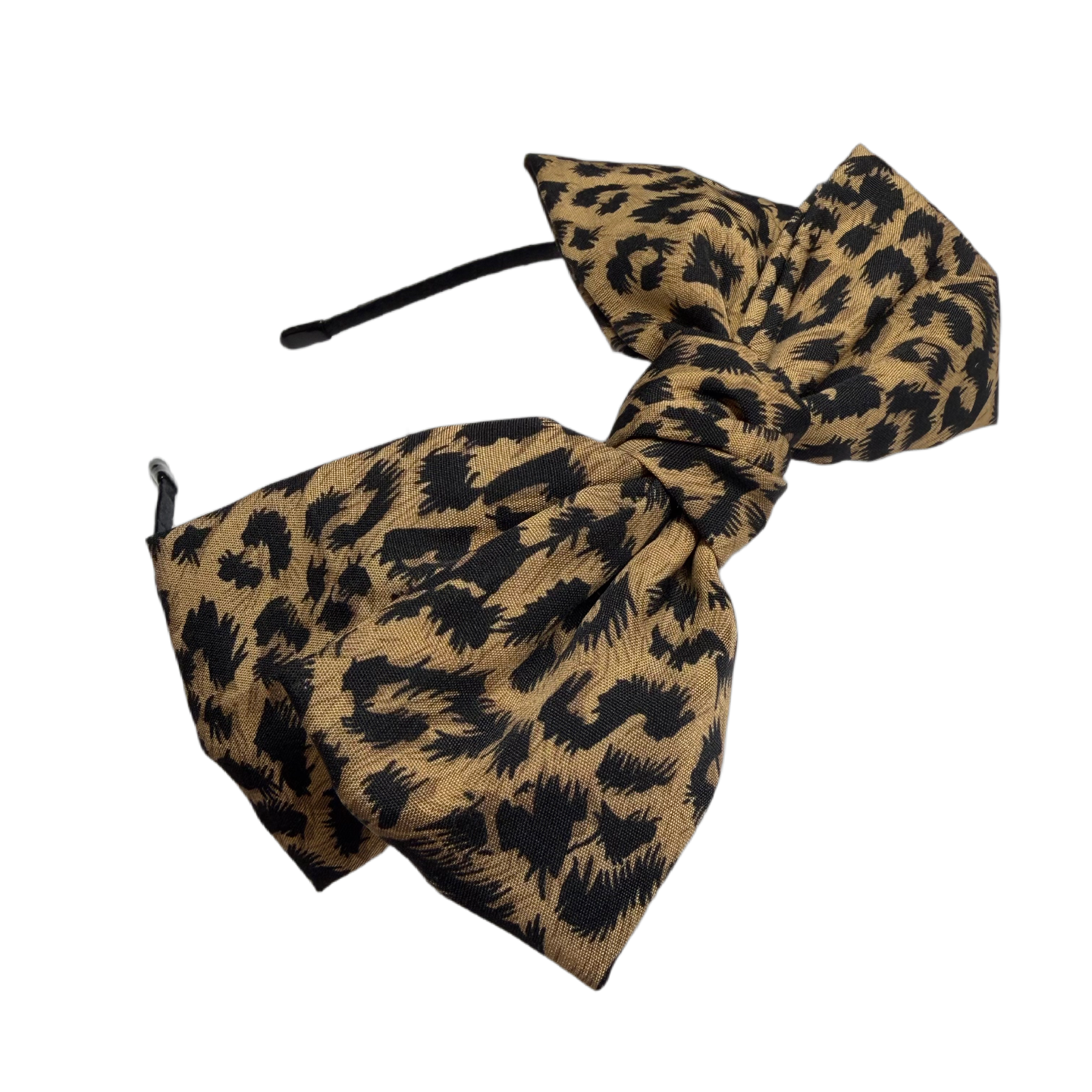 schreibe einen emotionalen verkaufsstarken Titel und text für Onlineshop. Haarreif,oben Mitte Masche, animalprint. Rockabilly. Mit Vorteilen. Schreibe nichts von gepolstert oder bequem. Mehrere titel vorschläge.