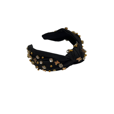 Bandeau rose avec noeuds et décoration strass