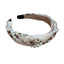 Geflochtener Haarreifen mit Blumenprint & Perlen – Romantischer Charme in Creme und Rost